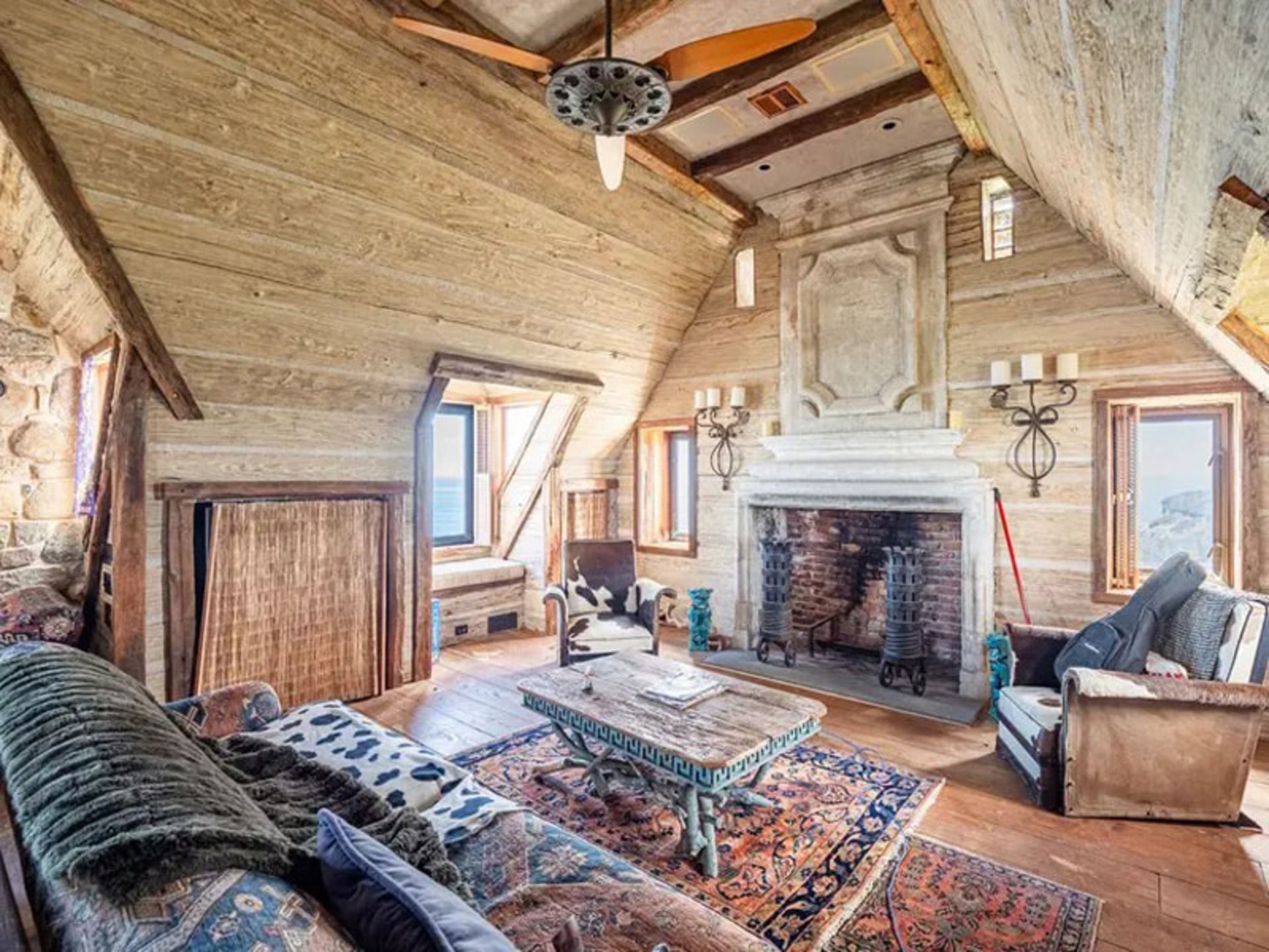 Living room with firefighting fireplaces in Montawak's stone mansion