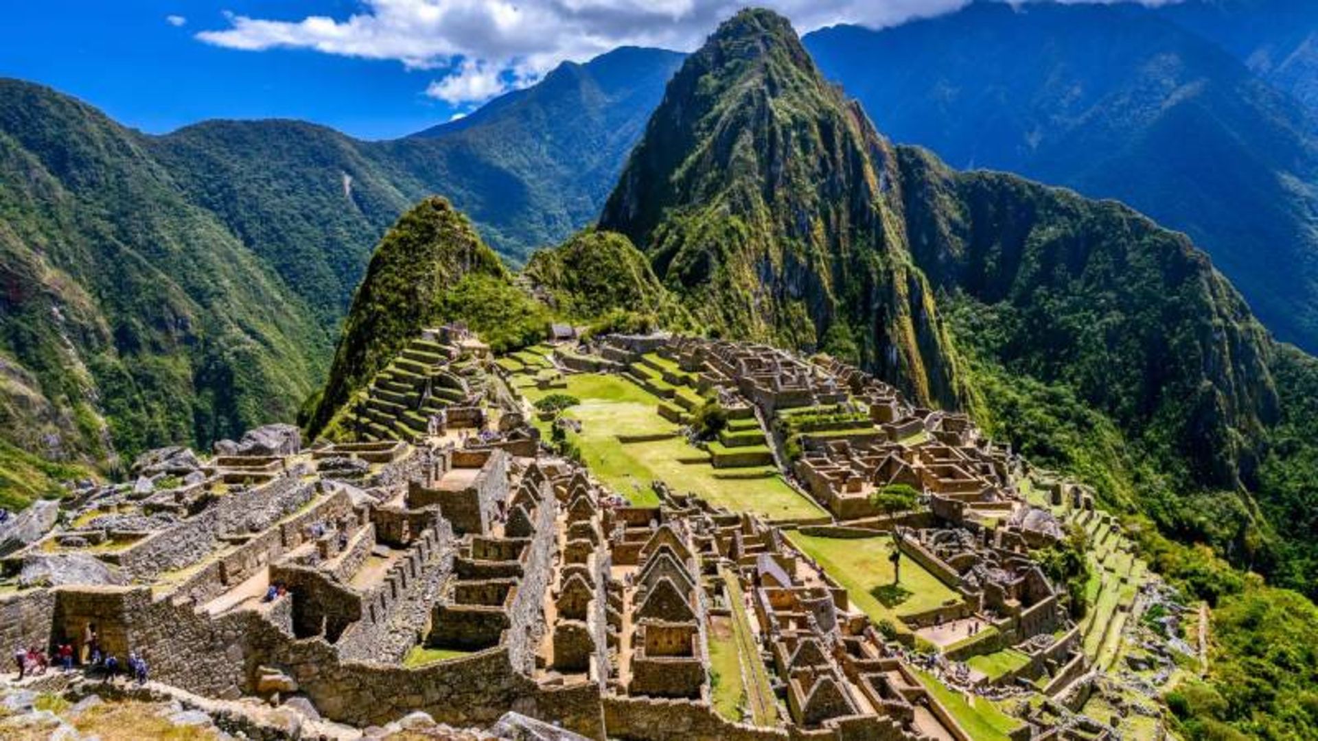 Tourists visiting the ancient site of Machu Pico