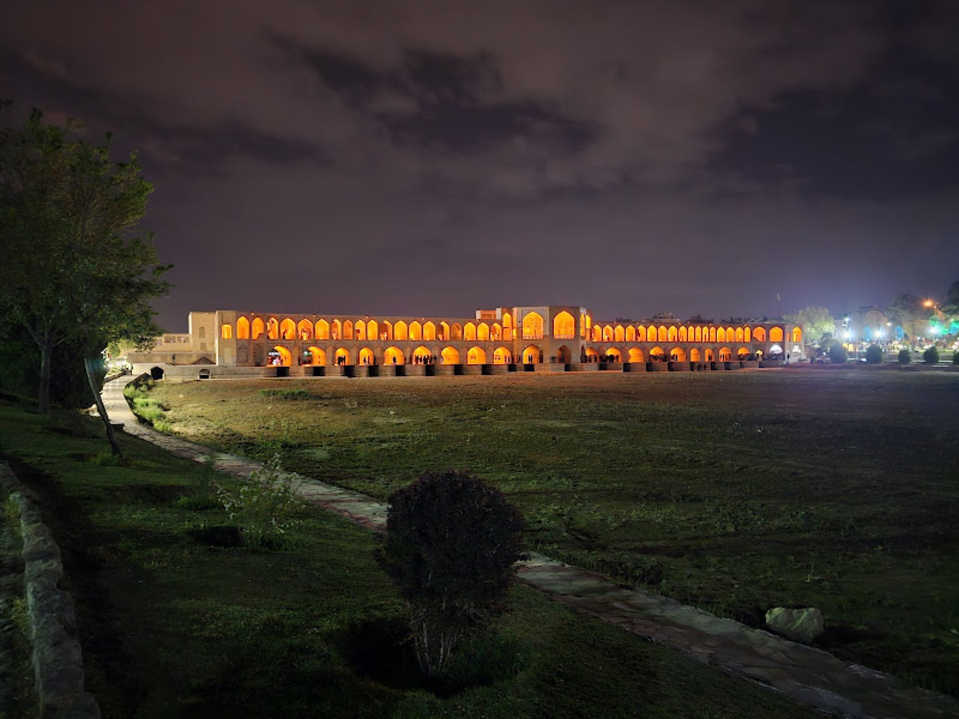 Khaju bridge in the night with cloudy sky