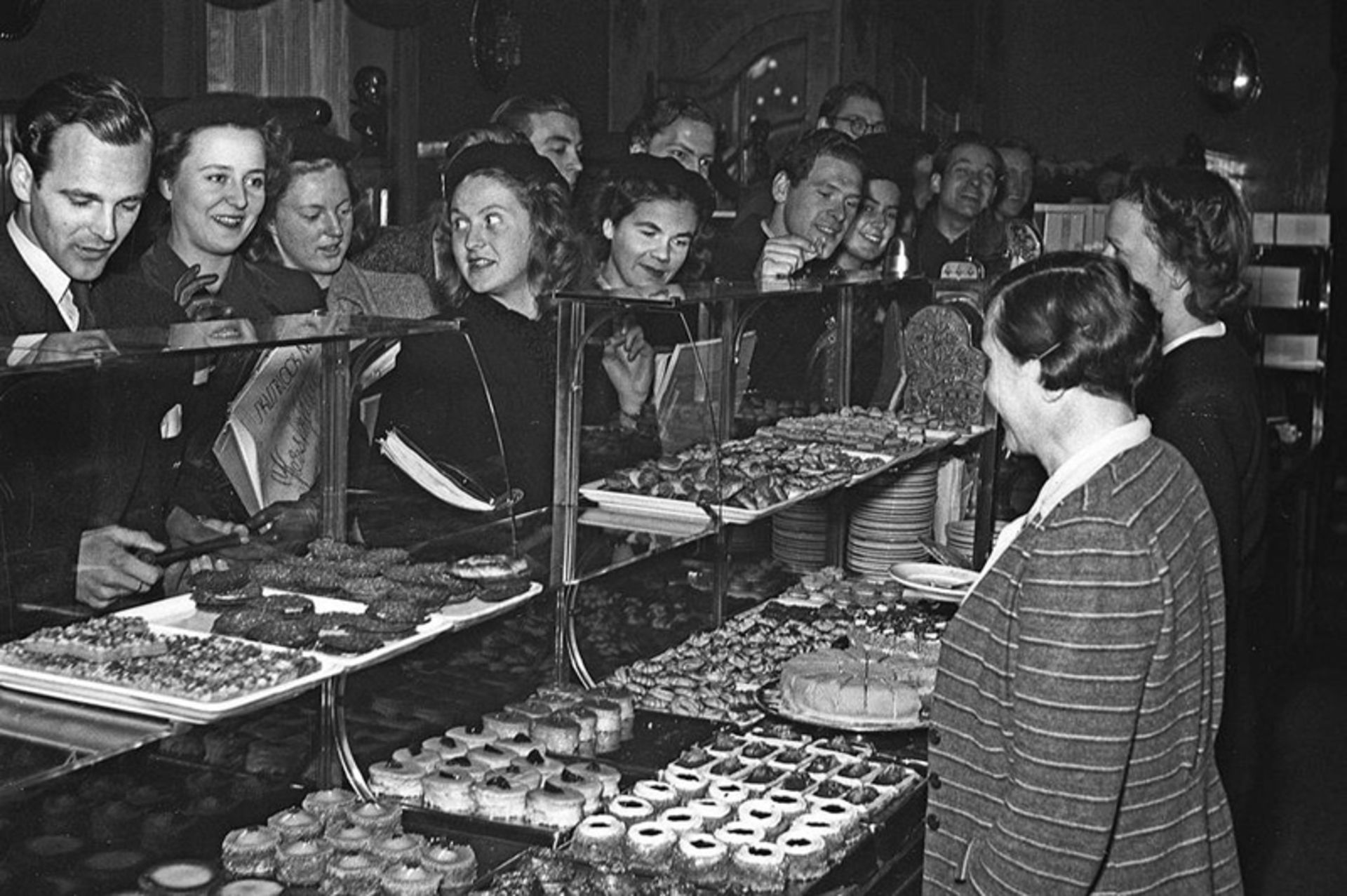 People gather at a café in Sweden
