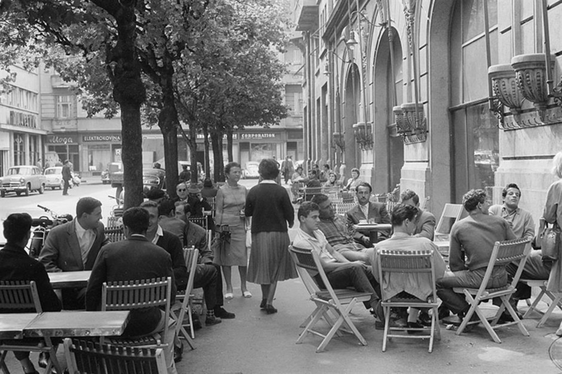 Outdoor people's presence in street cafes, Belgrade