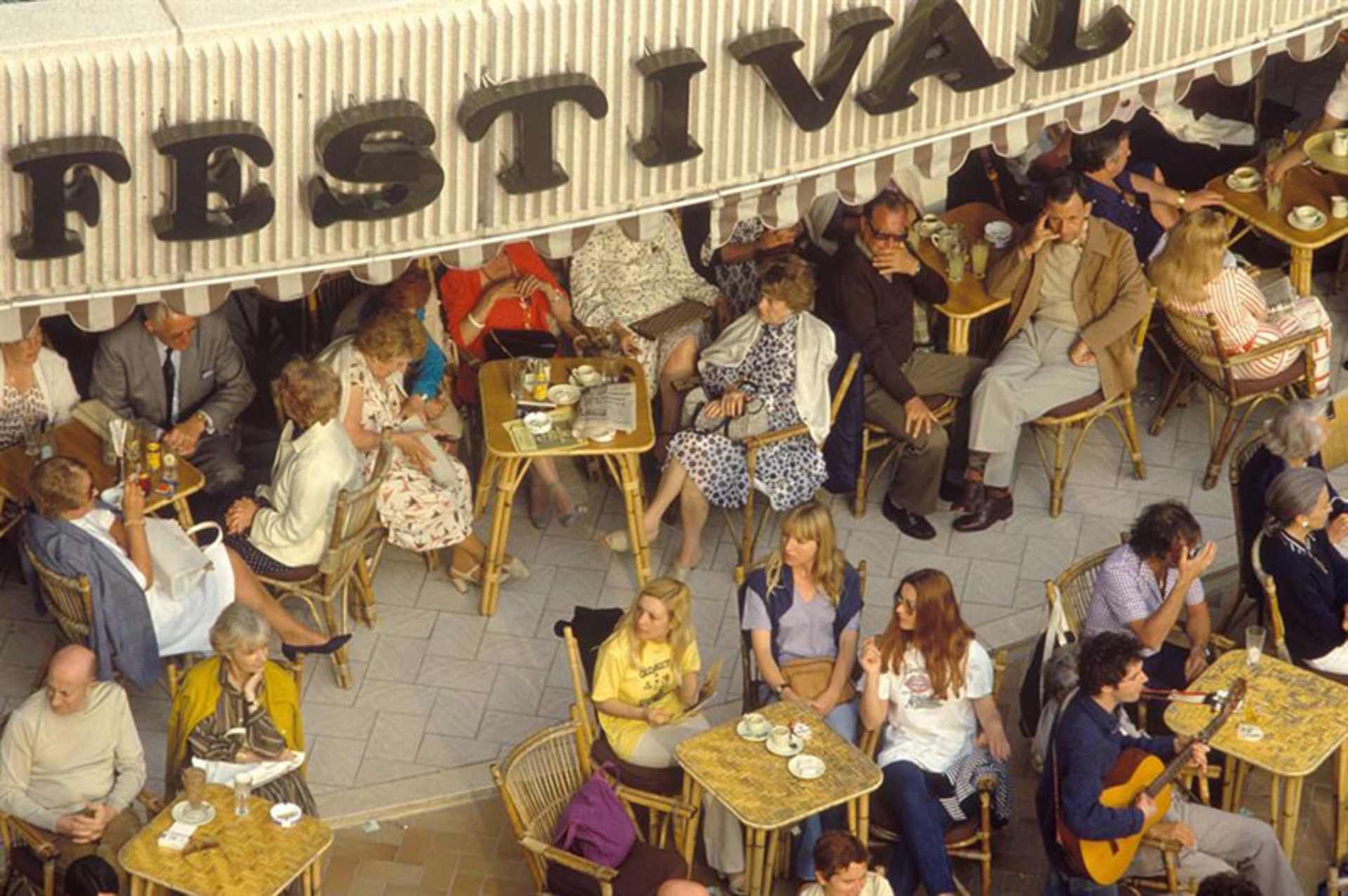 Old photo of people's presence in the festival cafe, Ken