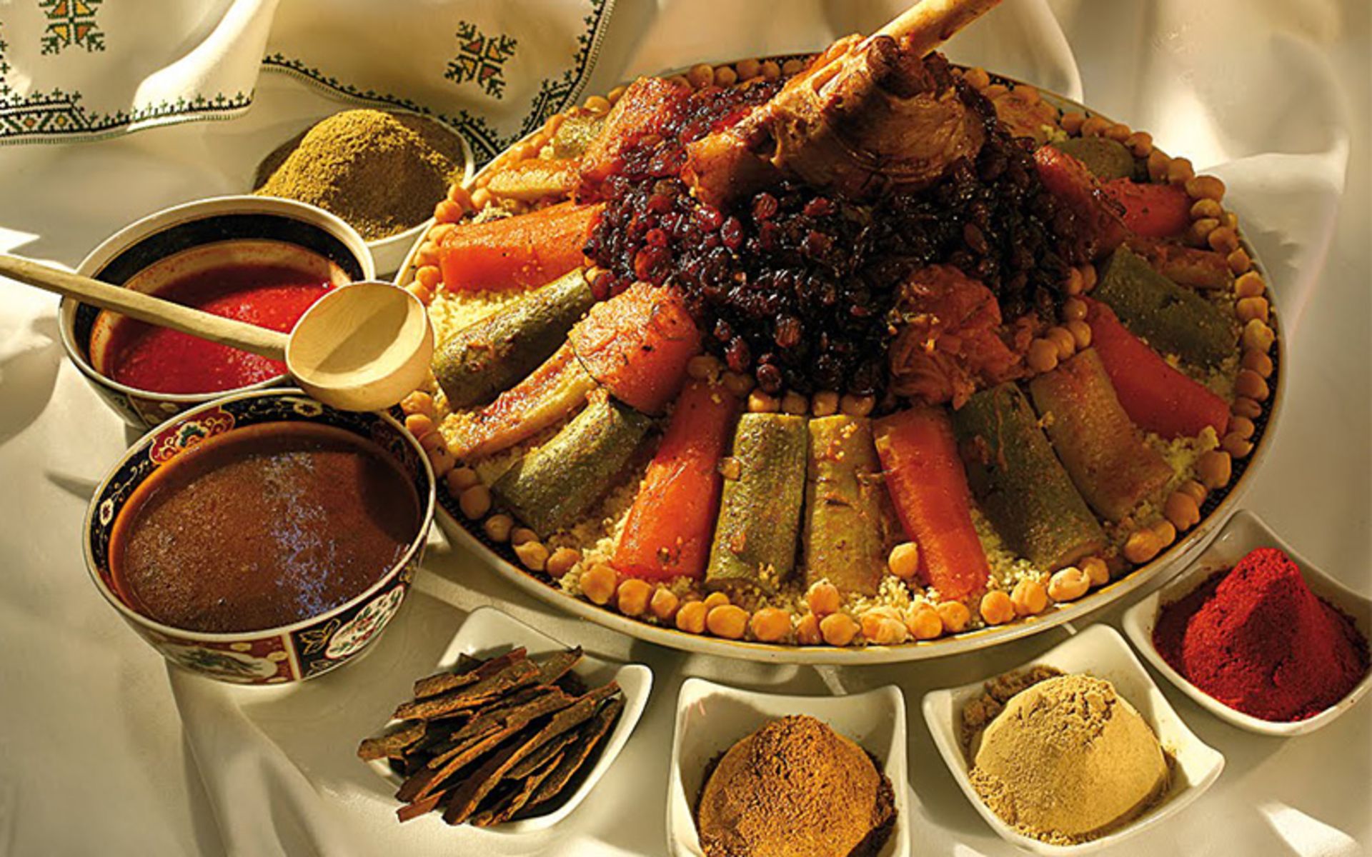 Cuscus plate alongside different spices