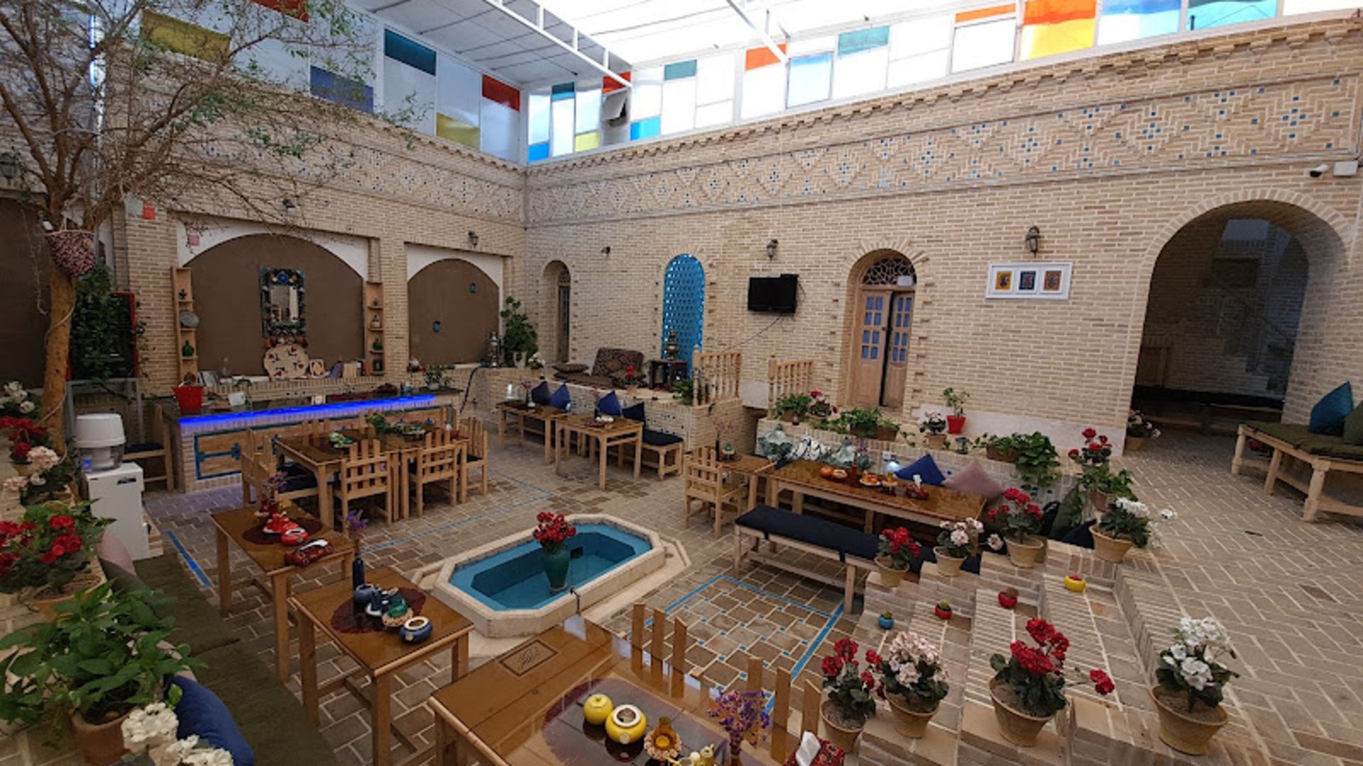 Shahbaz Kerman Traditional Residence with Wooden Tables and Chairs