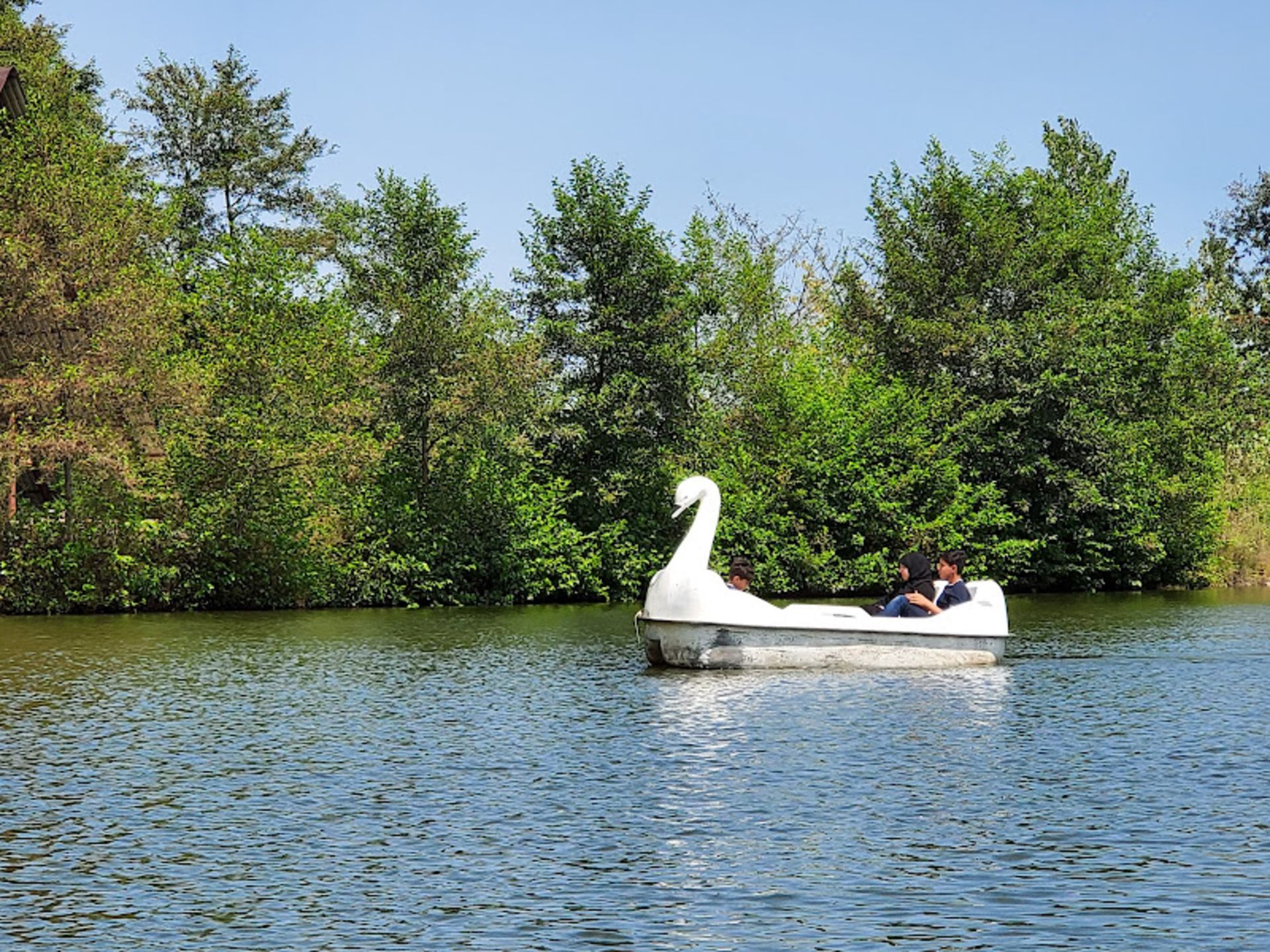 White pedal boat on Lake Gisum