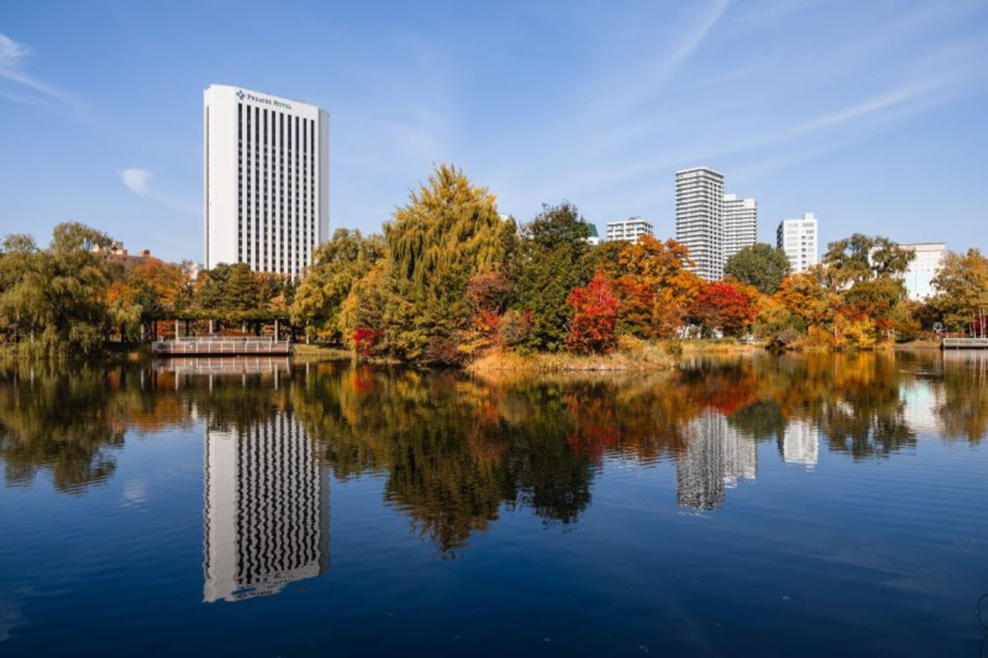 Reflection of Autumn Trees in Lake Nakajima Japan
