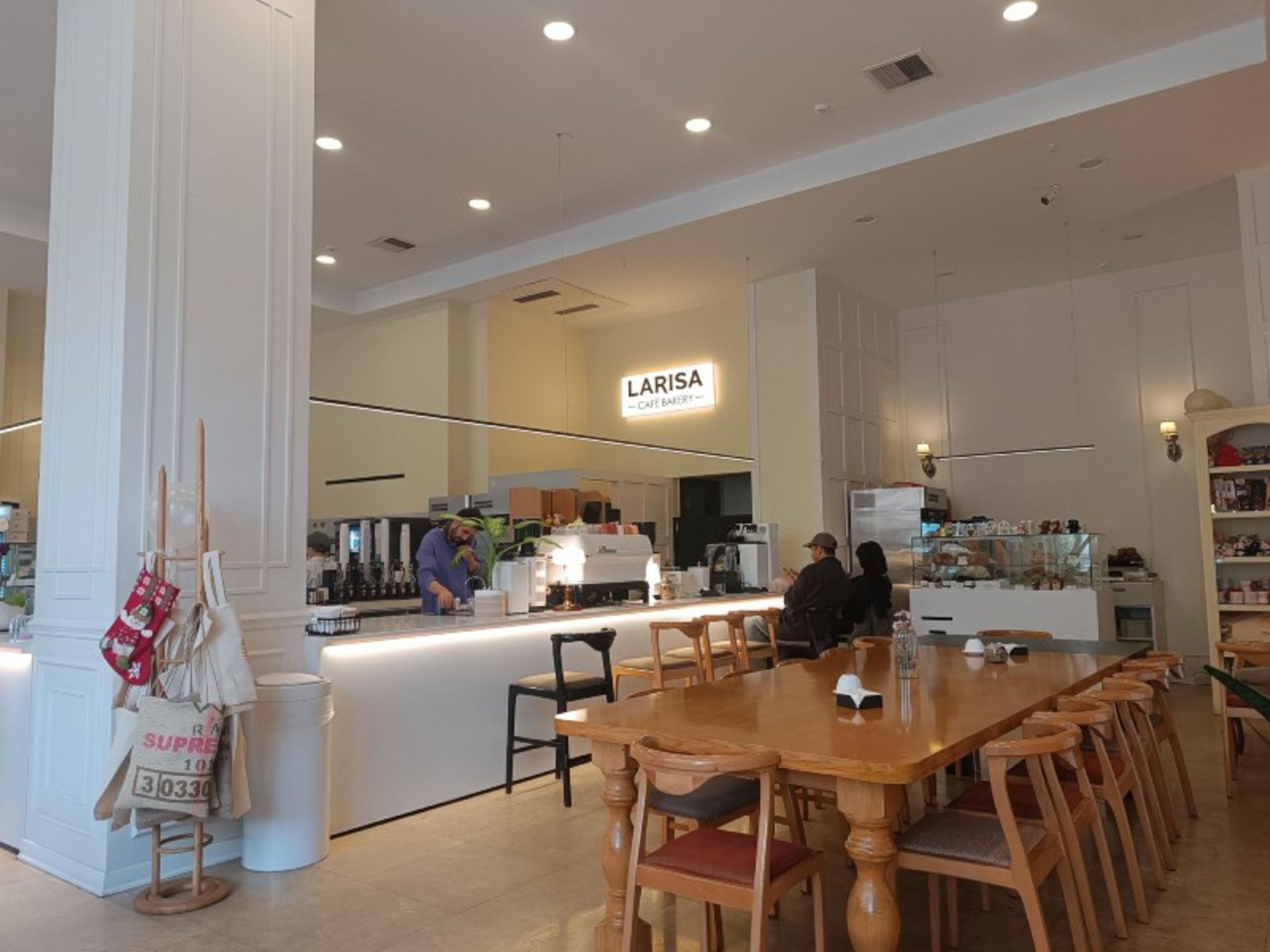 Tables and chairs in the Baker Cafe Larissa Cafe Hall