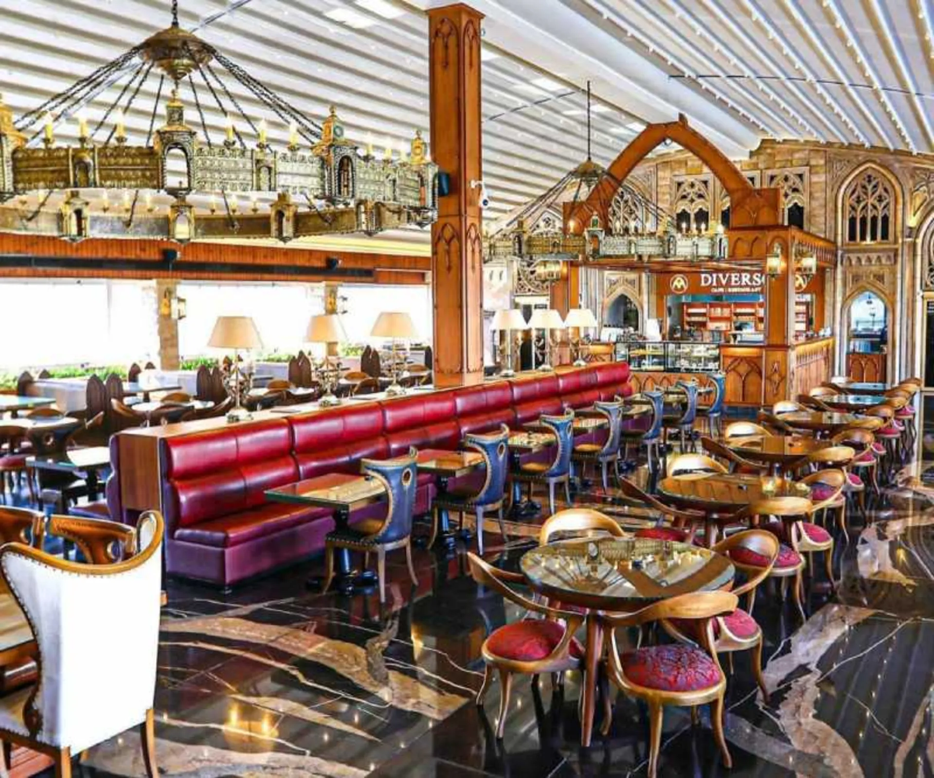 Tables and chairs in the café hall of Diorso Restaurant