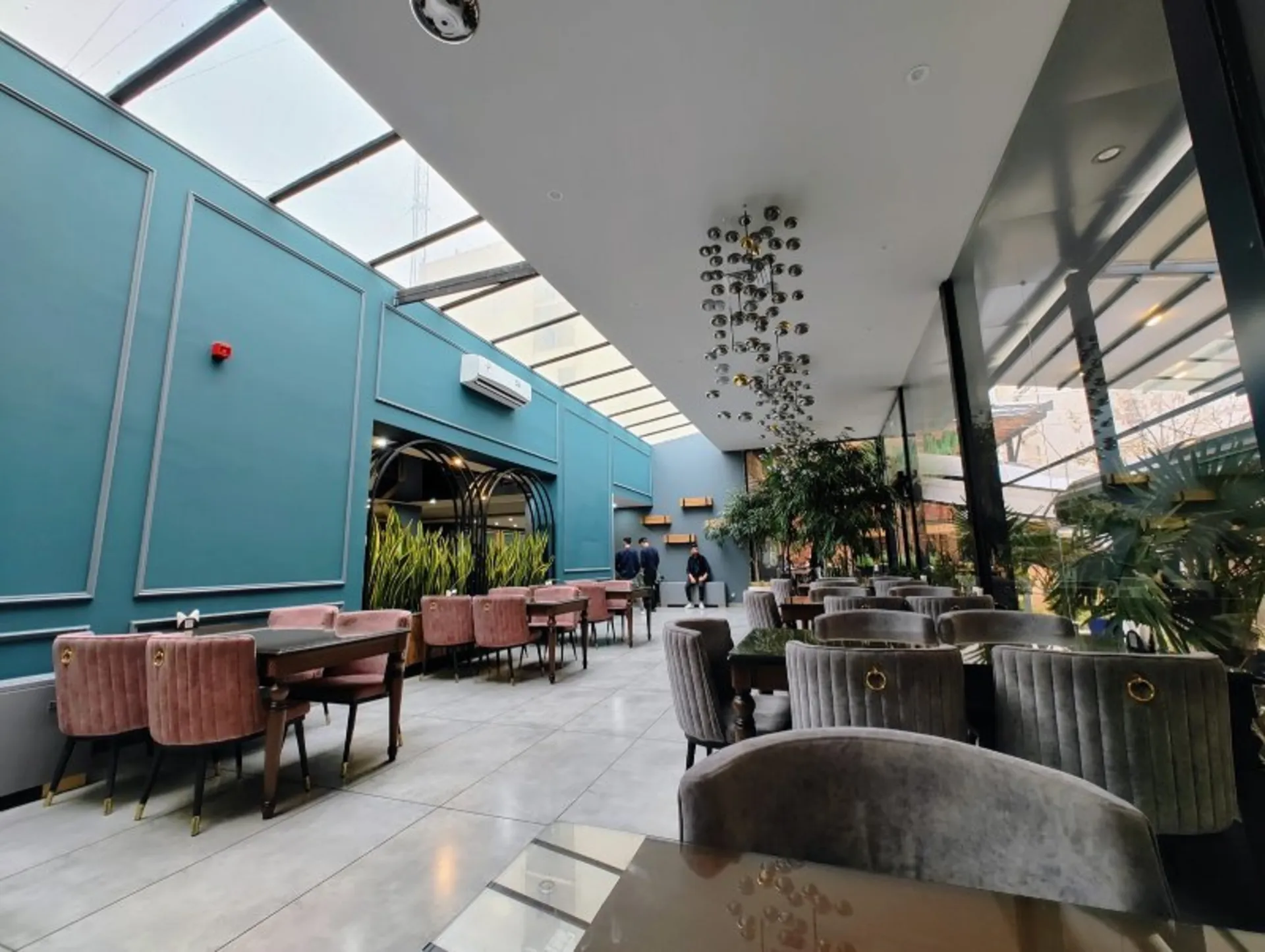 Tables and chairs in the café hall of the restaurant