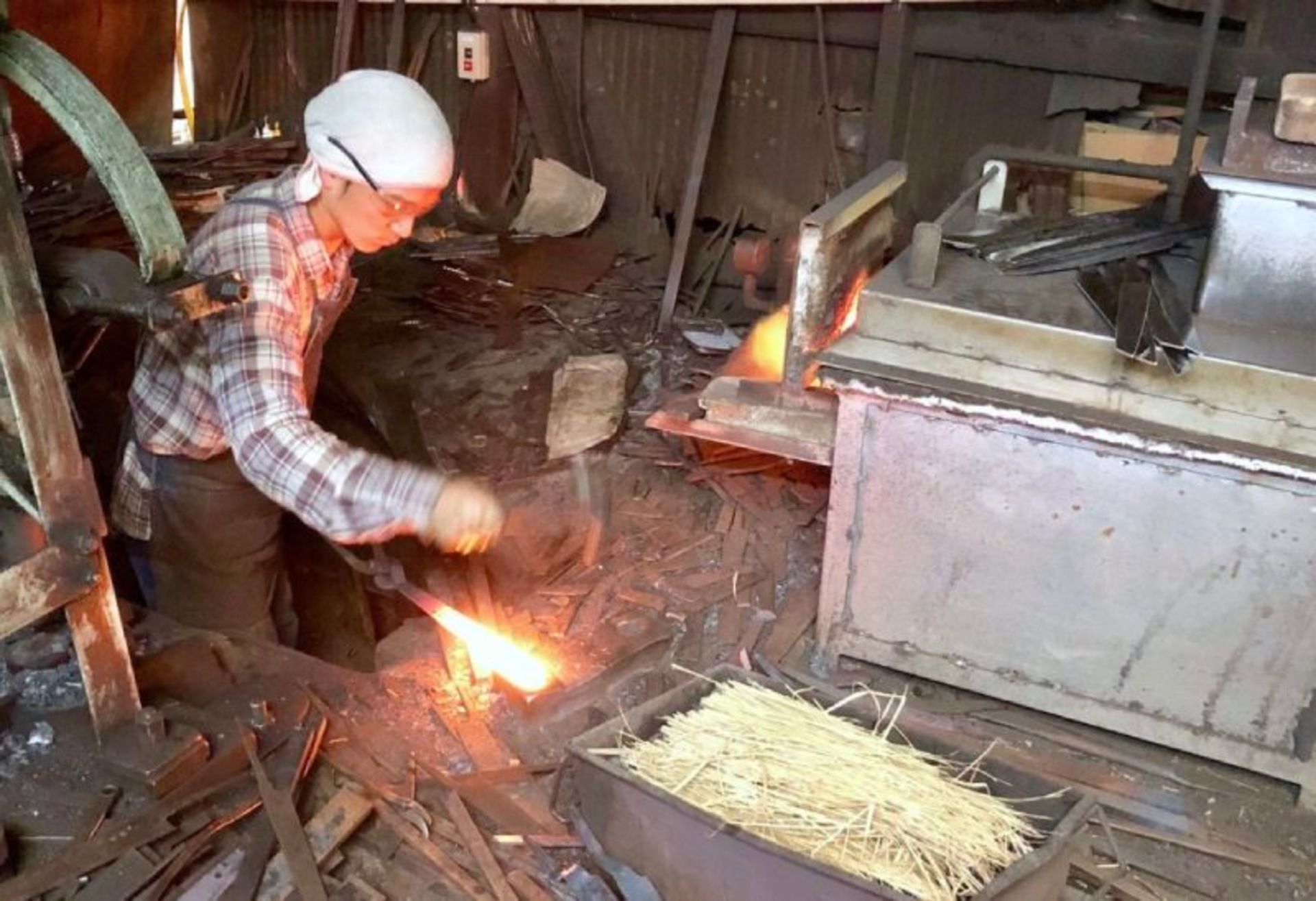 A person making a sakai knife