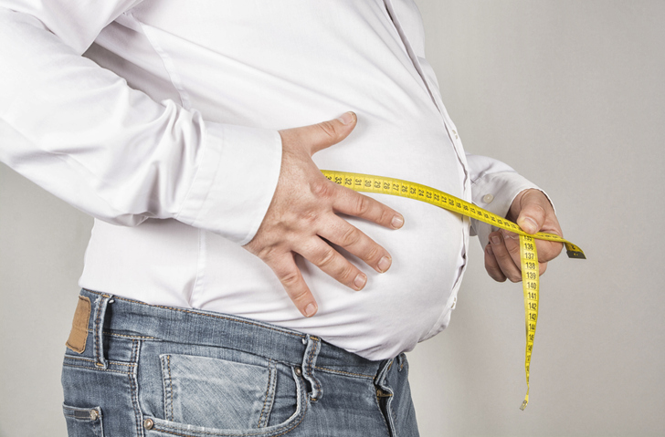 What is the cause of sudden abdominal and side obesity and unexplained weight gain in men?