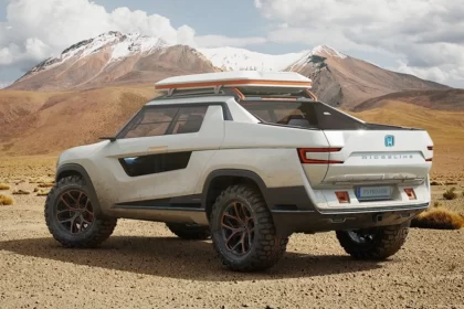The back view of the white Honda Ridgeline pickup