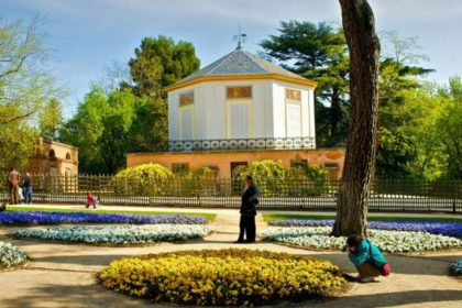 Tourists shooting in the nature of L -Capricho Madrid Park