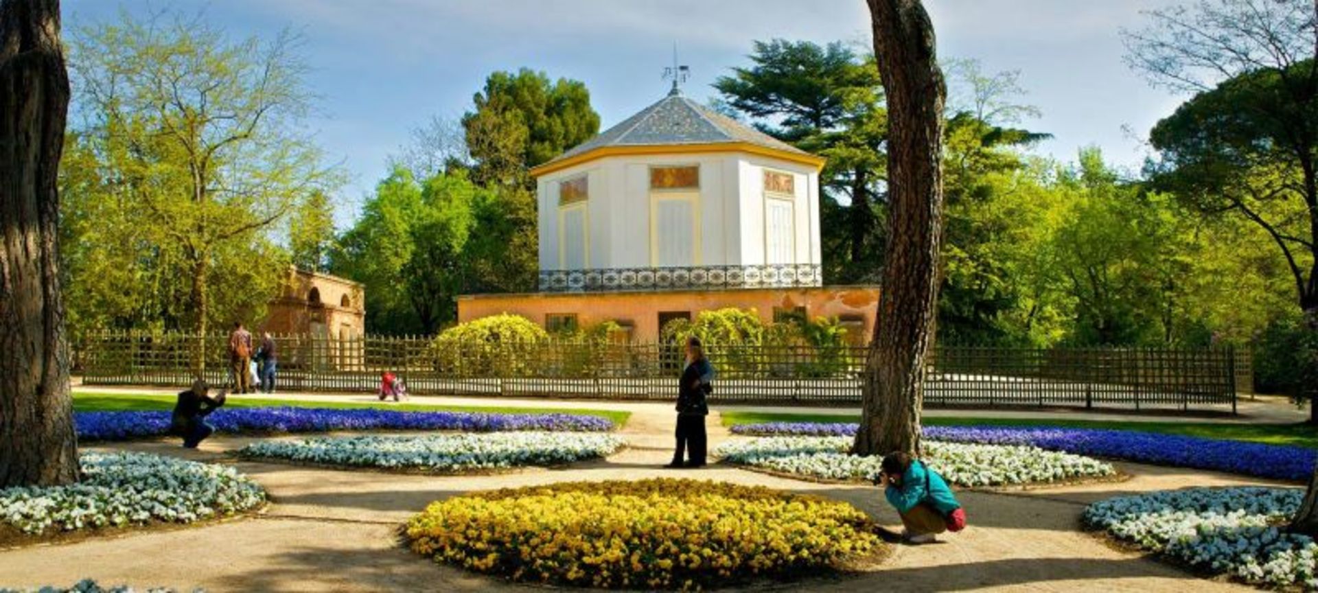Tourists shooting in the nature of L -Capricho Madrid Park