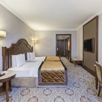 Double room with cream decoration in Elite World One Hotel