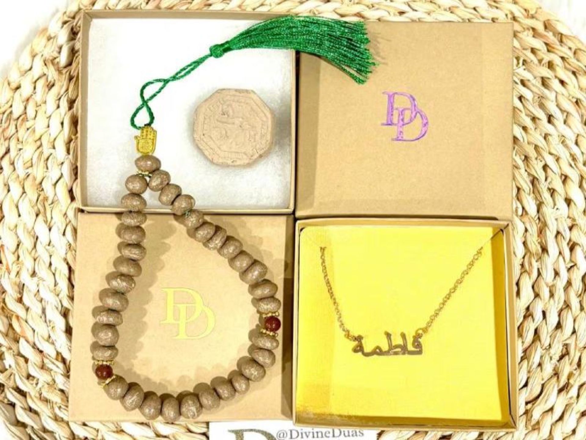 Gold with the name of the imams of Karbala souvenirs