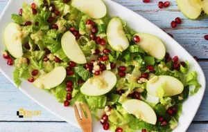 How to prepare delicious pomegranate and green apple salad with special sauce