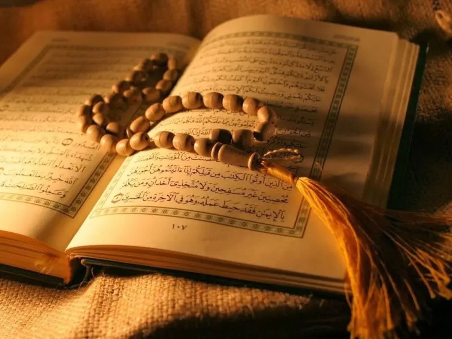 Pages of the Holy Quran and Tasbih