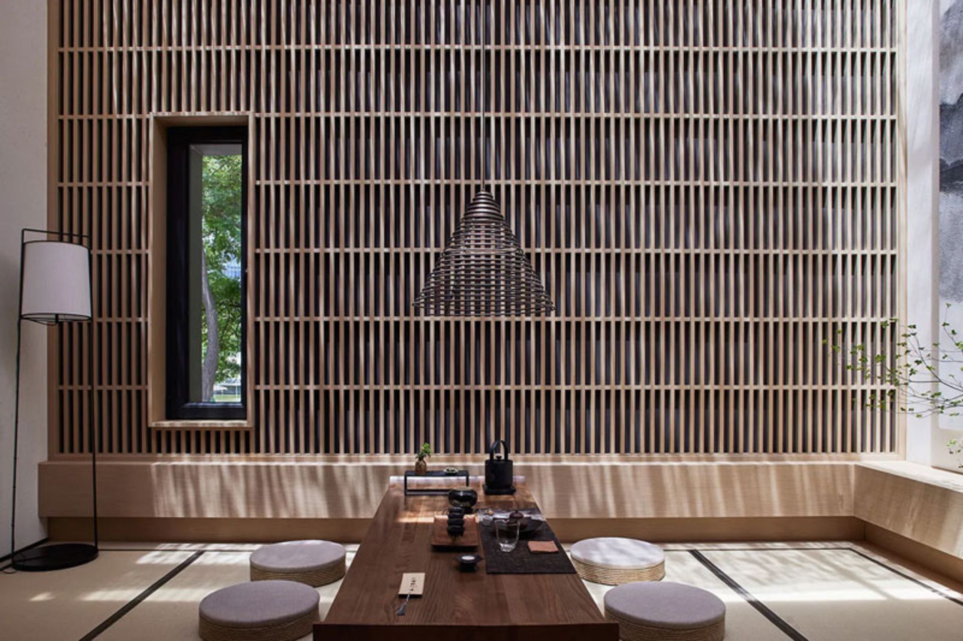 The traditional tea room of Blue Lake Tea House with cushions on the floor