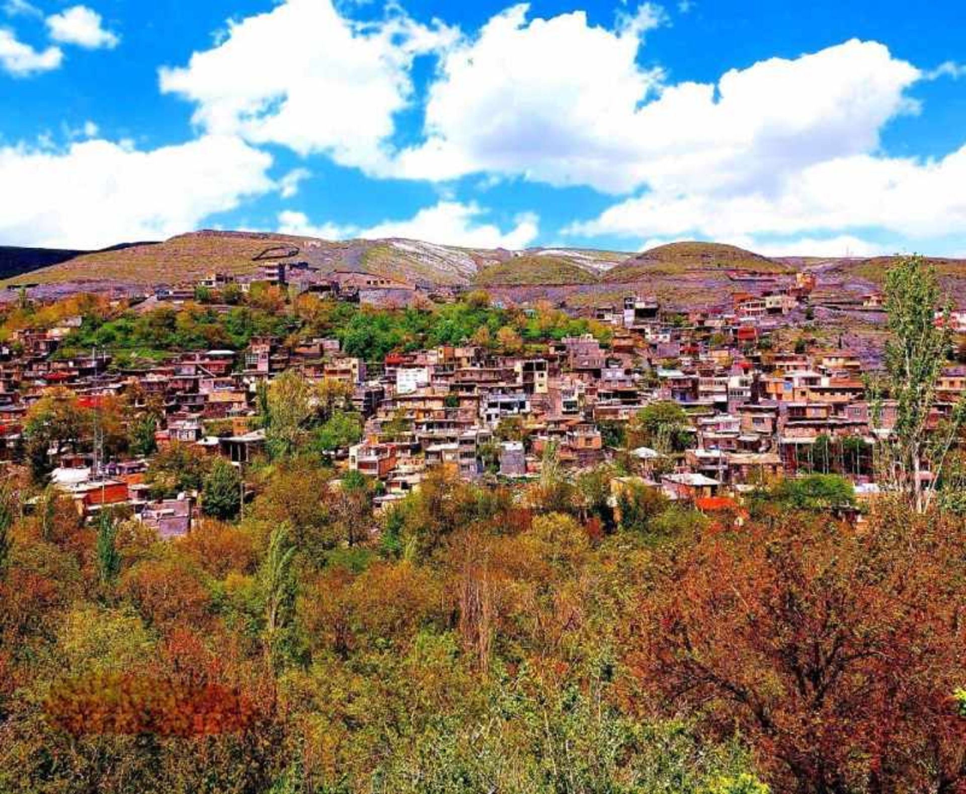 The terraced houses of Ozghed village in autumn