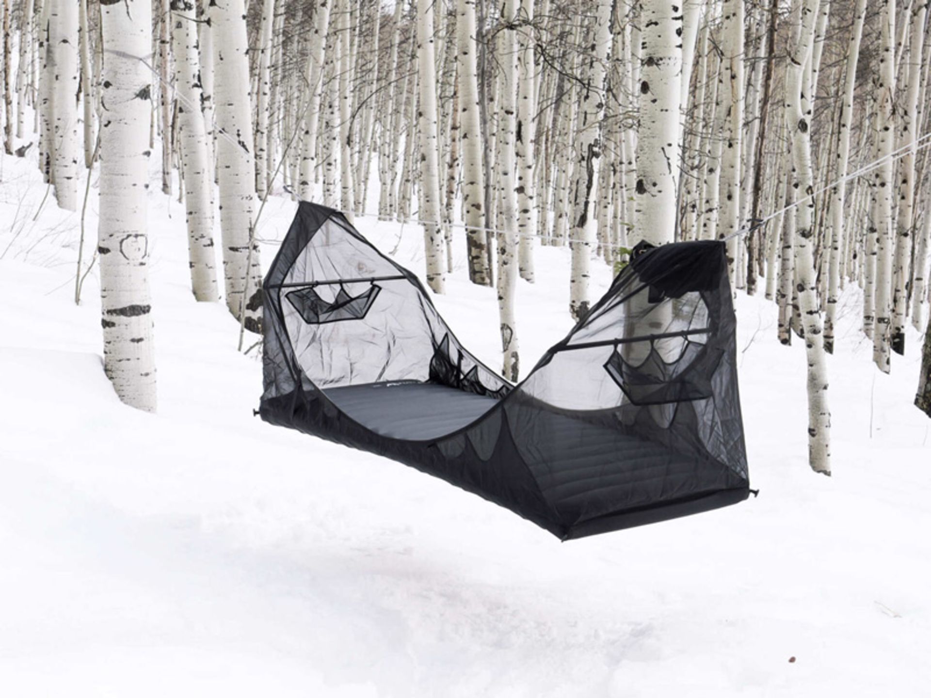 Specter's hanging tent in the snow
