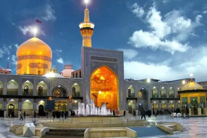 Azadi courtyard of Imam Reza shrine under the blue sky