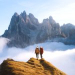 Climbing above the clouds among the Dolomite peaks of Italy