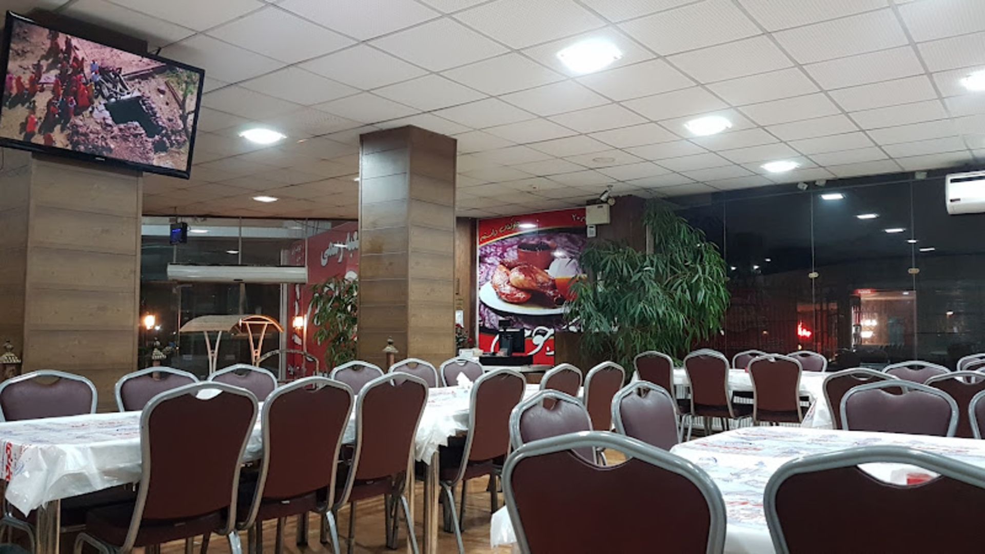 The interior of Akbar Chicken Kalbadi restaurant in Shahrood