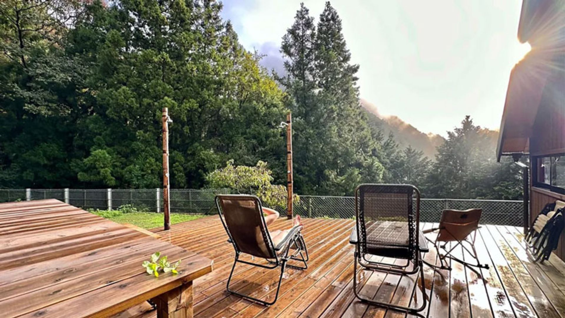 A wooden terrace facing the forest in a Japanese country hotel