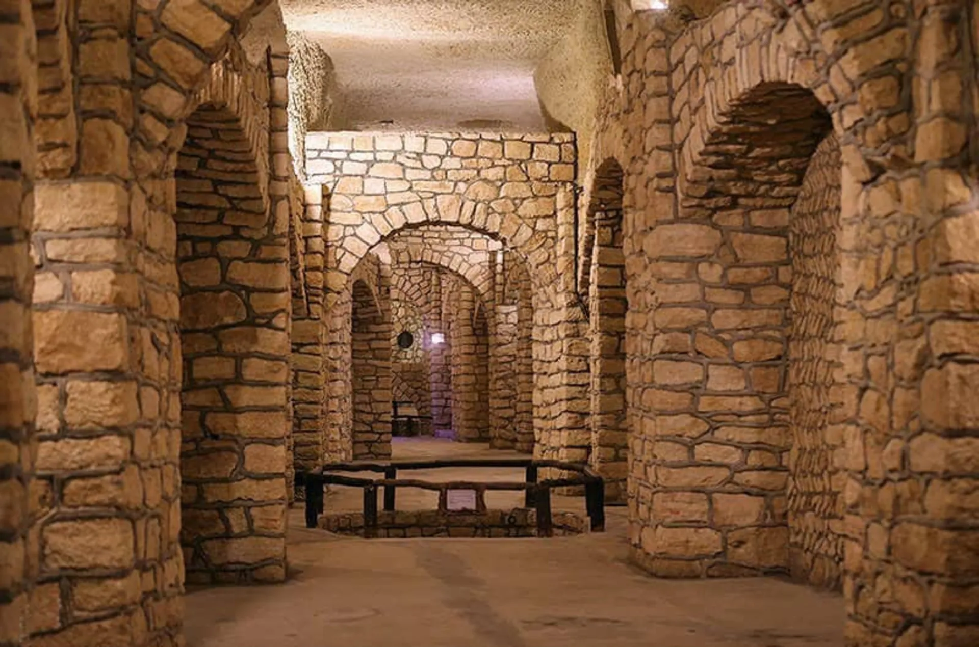 Corridors and stone walls of the underground city of Kariz