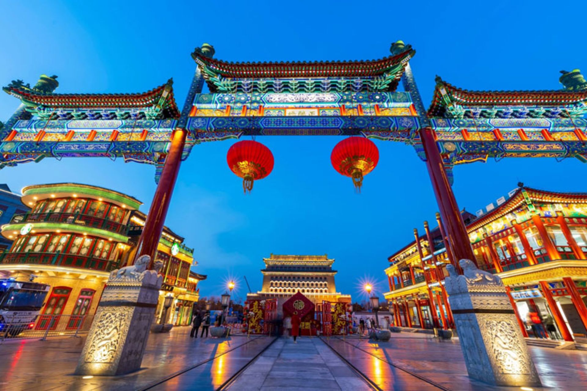 A traditional and illuminated gate in the streets of Beijing