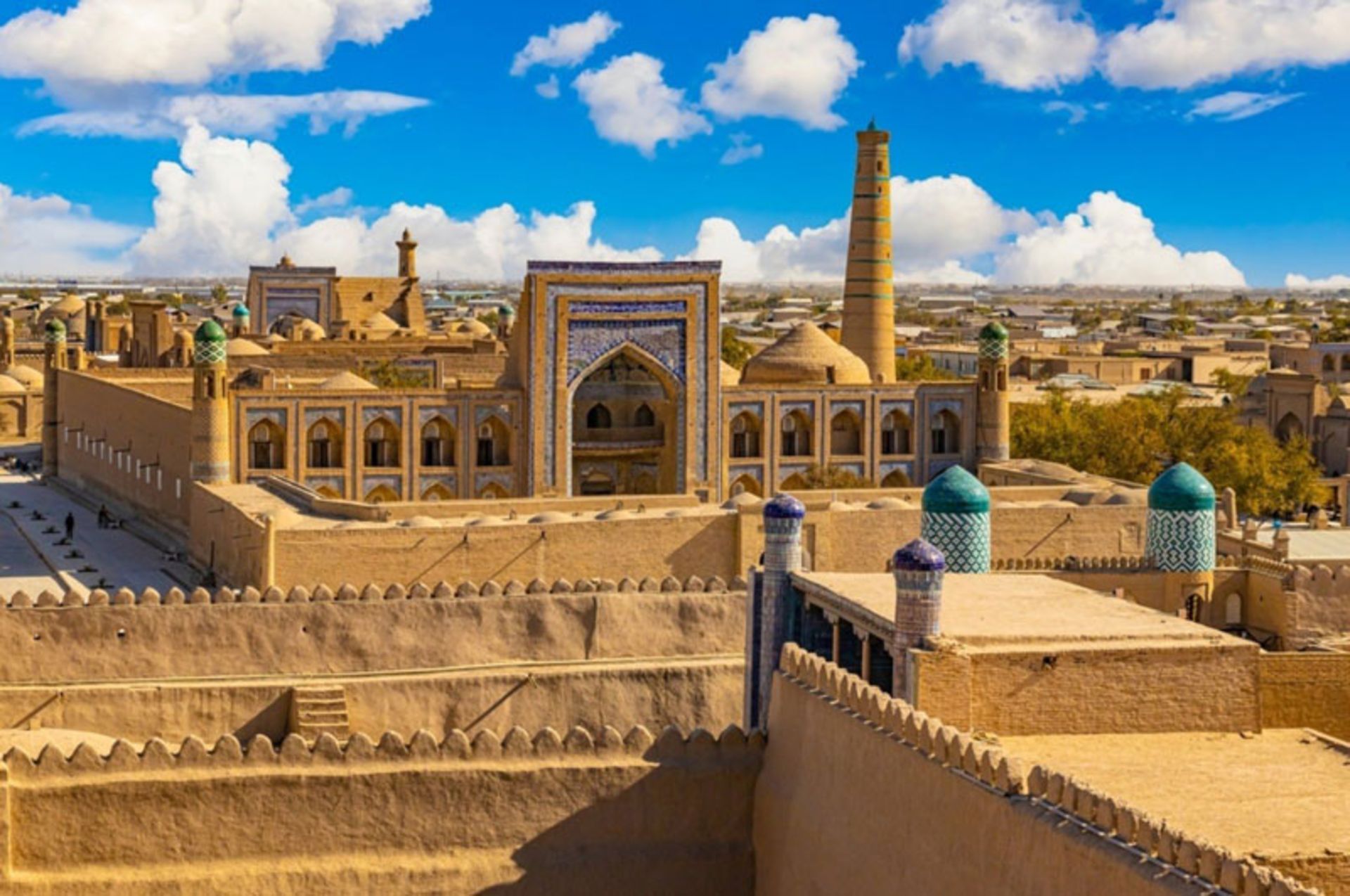 Ancient architecture of Khiva, Uzbekistan with minarets and adobe walls