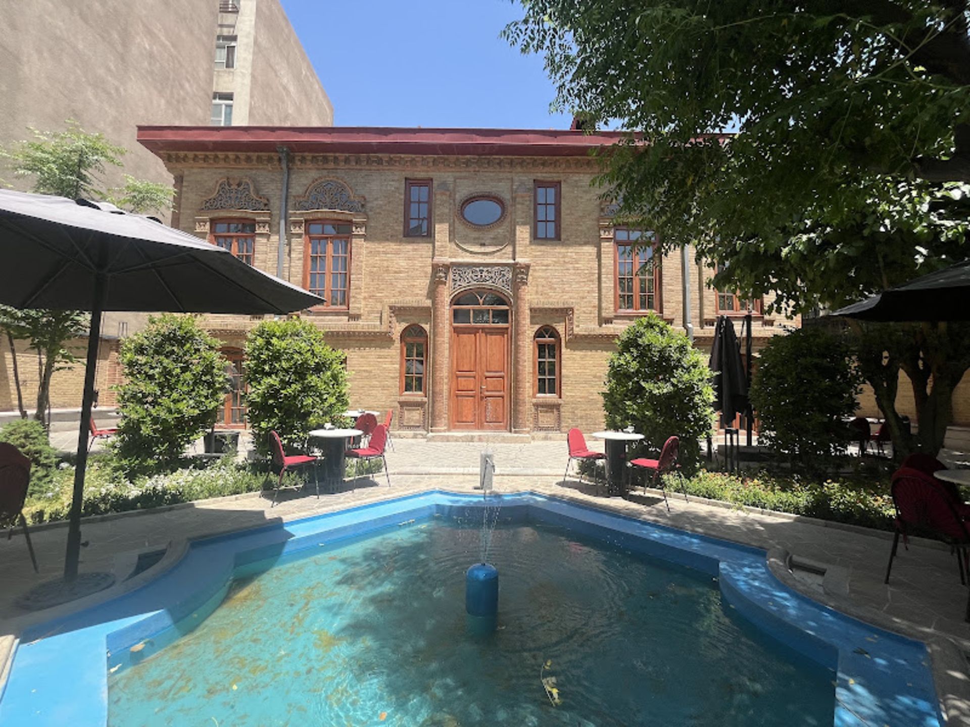 The beautiful courtyard of Nizamieh boutique hotel in Tehran