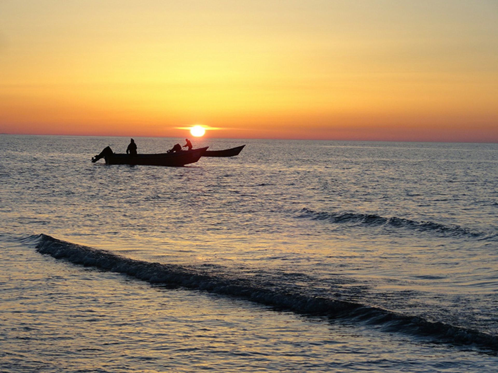 Motor boats go on the beach in Babolsar