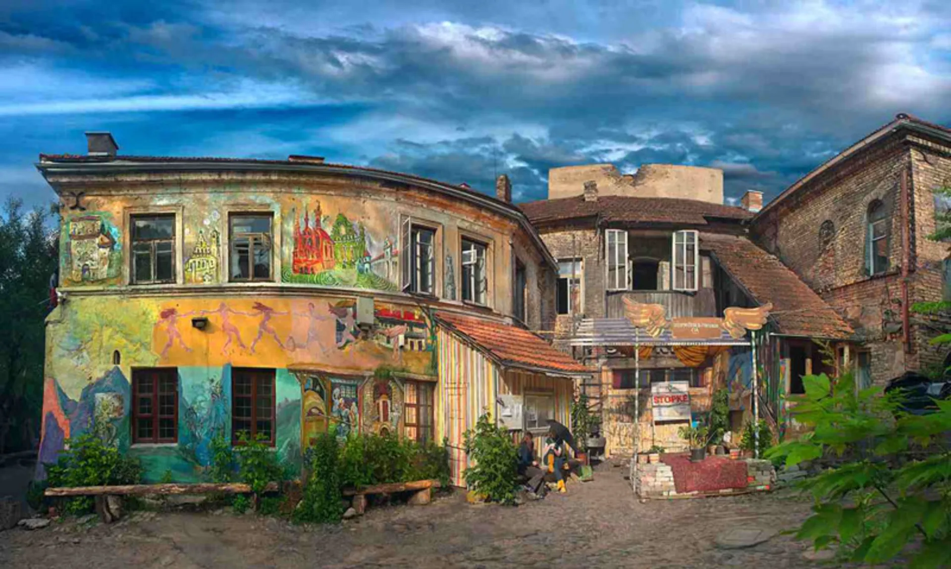 The courtyard of Ojupis Art Development Center with colorful walls in Lithuania