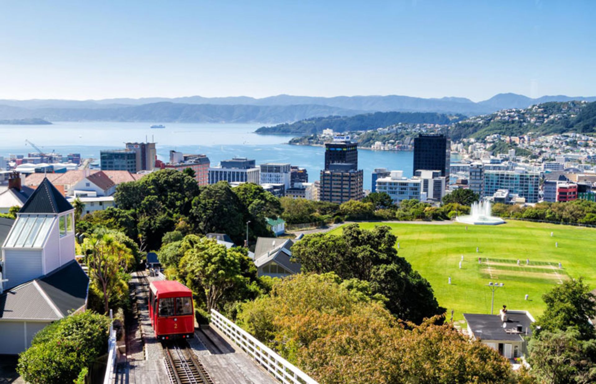Red cable train in the scenery of the coastal city of Wellington