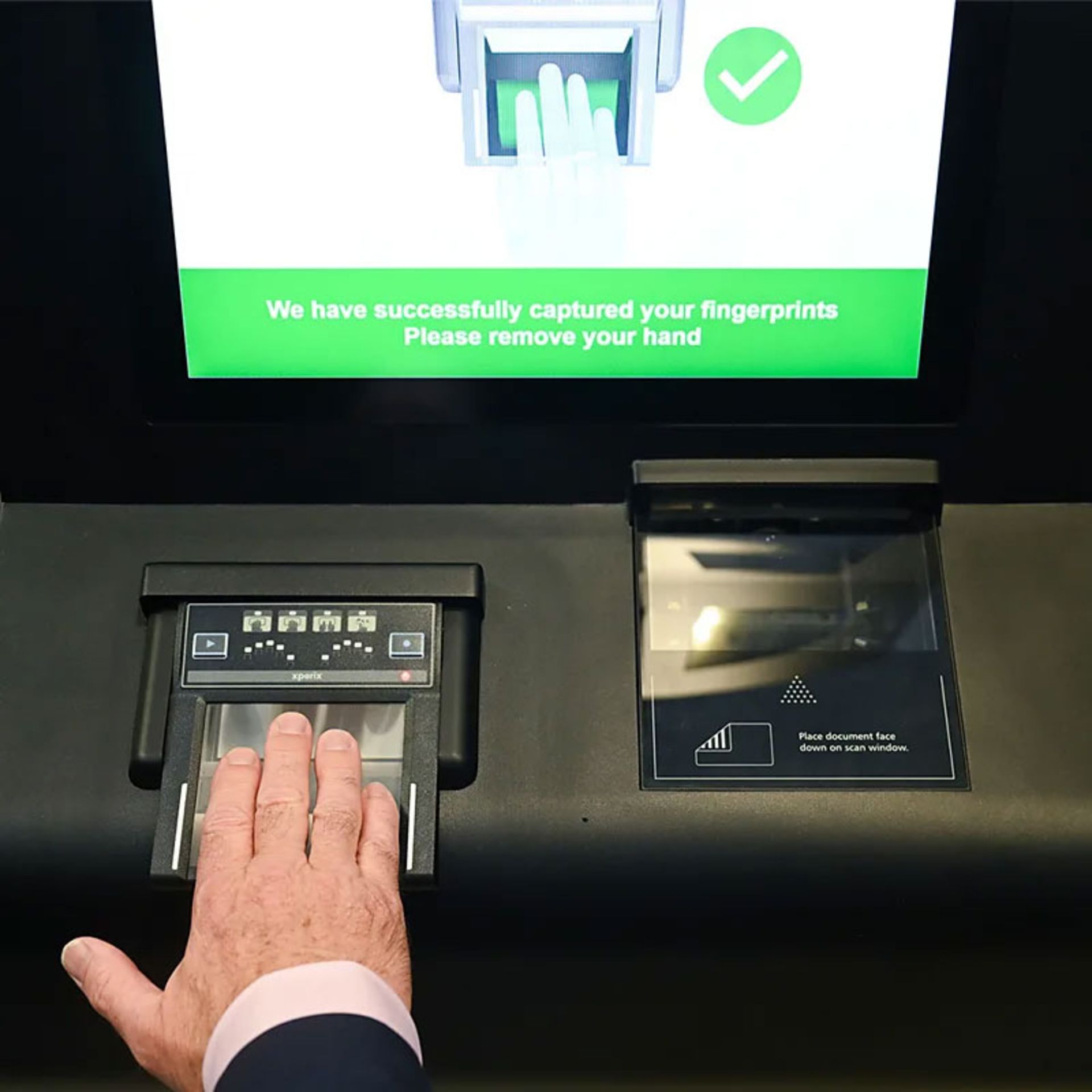 Biometric scanner to register fingerprints at the border