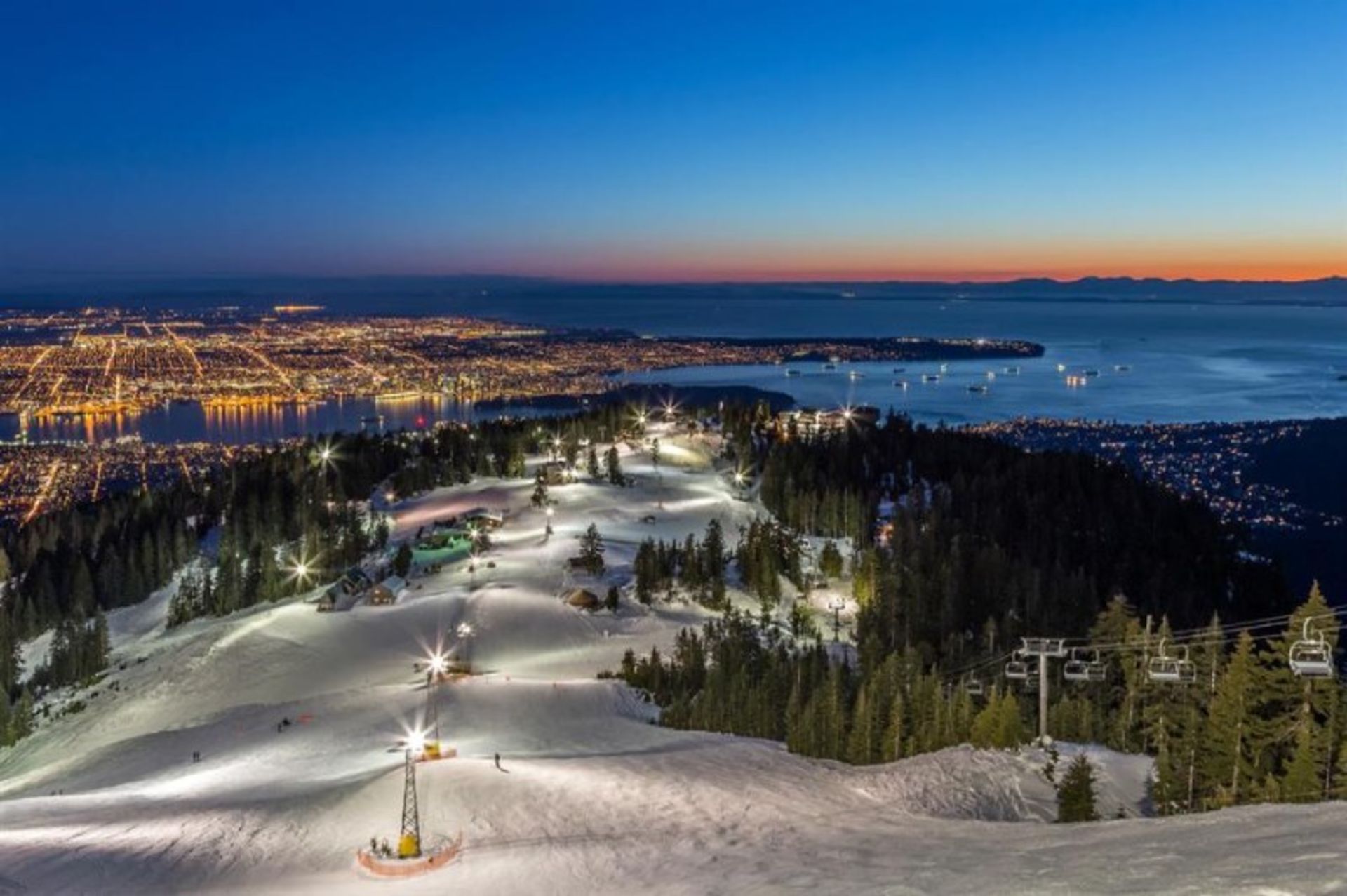 Snow ski resort and Vancouver city view