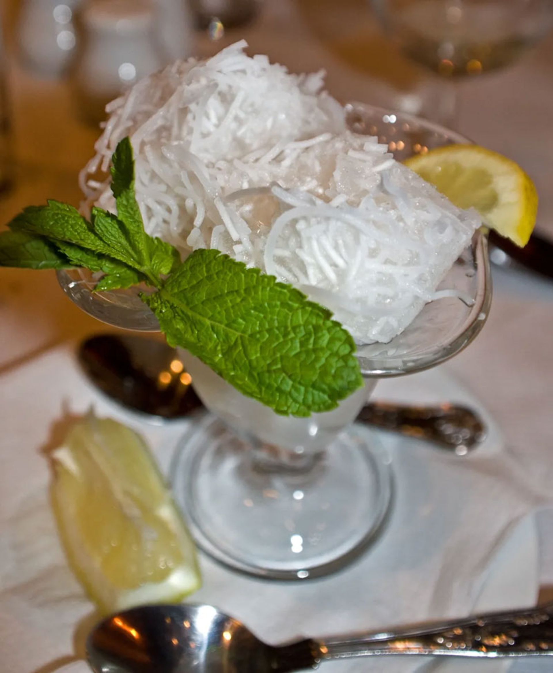 Traditional Iranian Faloodeh served with fresh lemon and mint