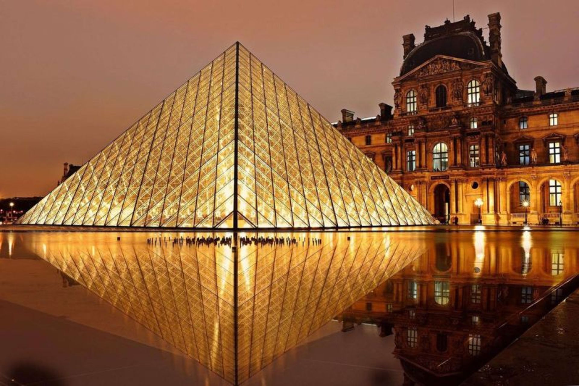 The exterior of the Louvre pyramid in Paris