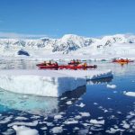 Explorers sailing in Antarctica