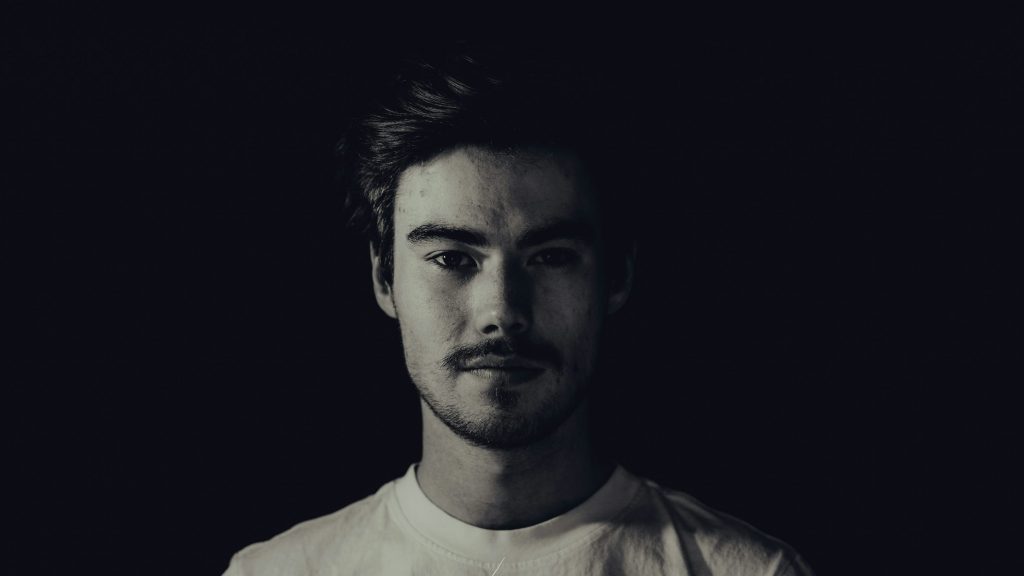 Black and white portrait image of a man made with professional prompts 