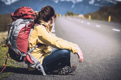 Female tourist on the back road