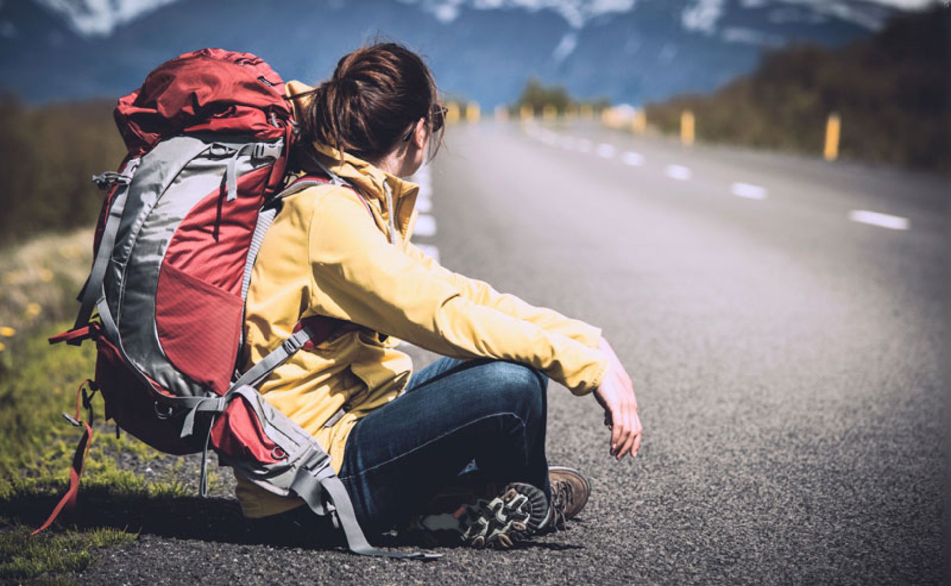 Female tourist on the back road