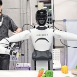 Chinese engineer training a humanoid robot