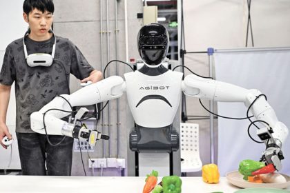 Chinese engineer training a humanoid robot