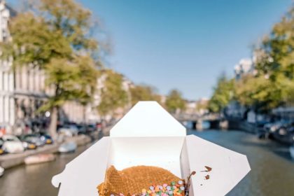 Waffles with colorful decorations on the canals of Amsterdam
