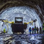 Giant drilling and concrete injection machines being prepared in the Rogue Fast Tunnel