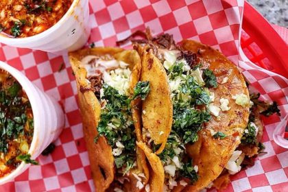 Two taco sandwiches on a square table