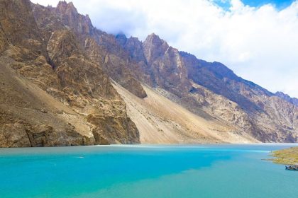 Colorful boats in the emerald waters of Attabad Lake